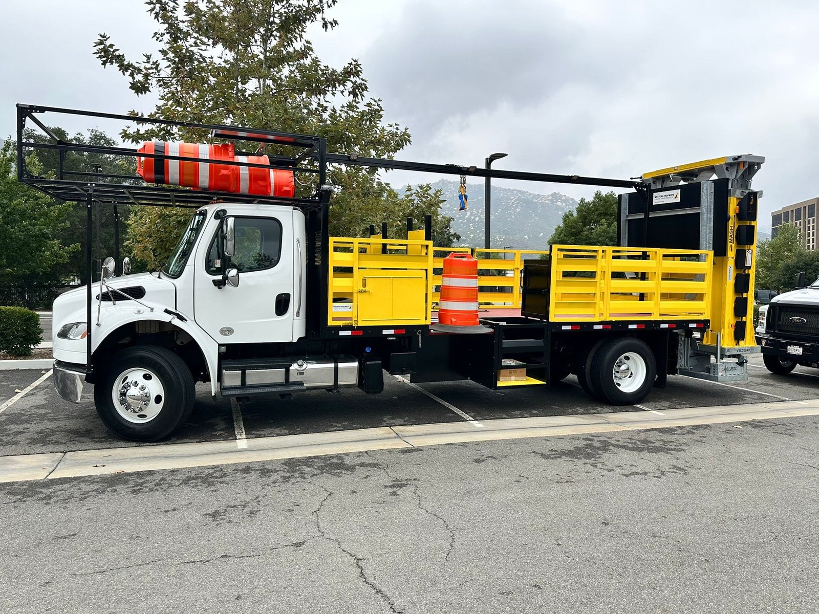 The Future of Traffic Safety: Emerging Trends and Technologies 1 2018 BARREL TRUCK FREIGHTLINER M2Traffic Safety Technologies Emerging Traffic Safety Trends Advanced Traffic Management AI in Traffic Control Smart Traffic Signage Road Safety Innovations Traffic Safety Equipment Western Highways Traffic Safety Work Zone Safety Solutions Future of Traffic Safety