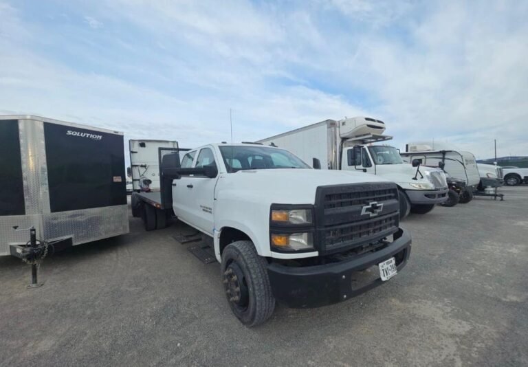 Traffic control truck with mounted safety equipment and organized work-zone storage