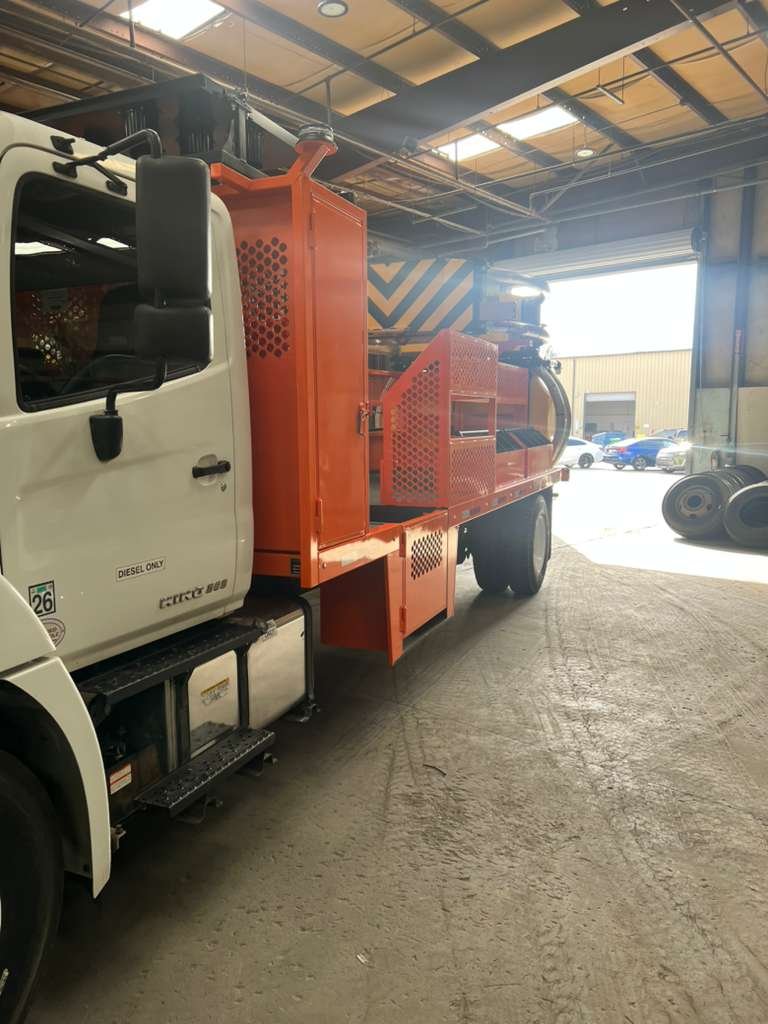 How to Choose and Manage a Safer TMA Truck Program 1 TMA truck with warning boards and rear attenuator on a work zone shoulder