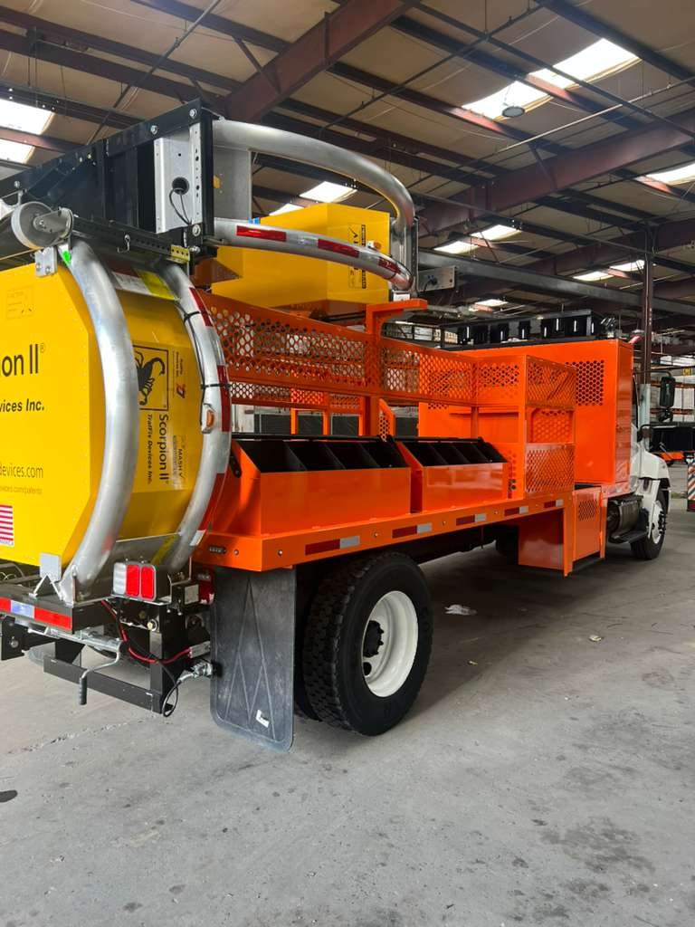 Choosing the Right Crash-Protection Setup for Highway and Work-Zone Fleets 1 TMA truck staged in a highway work zone