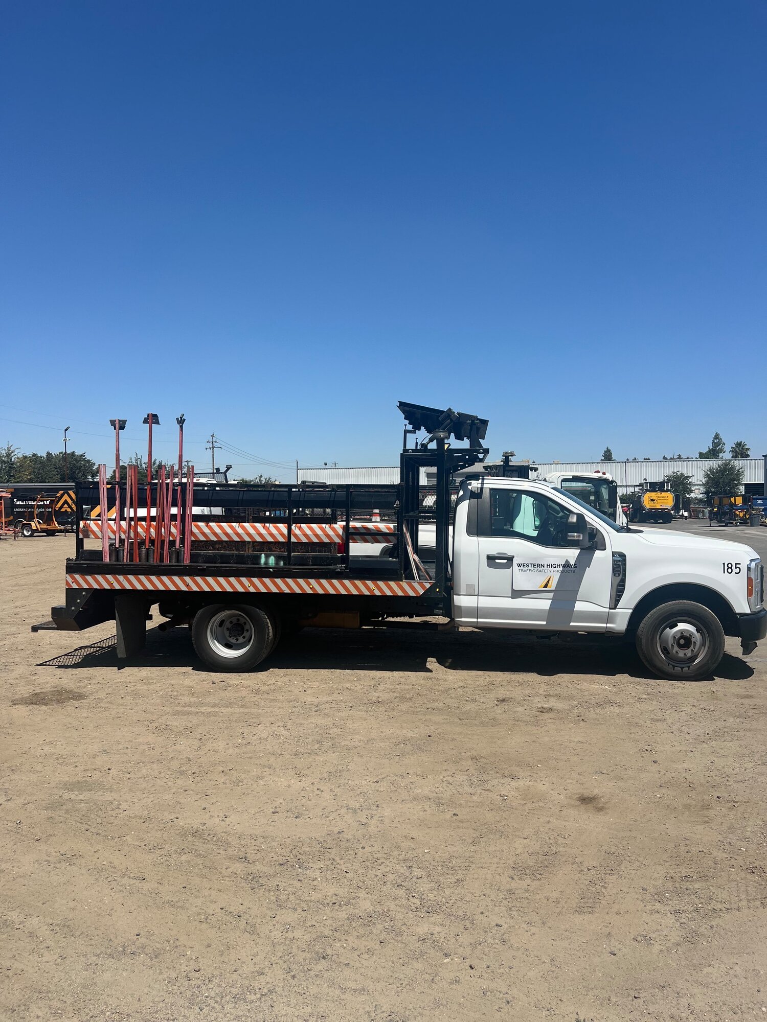 Generic white Ford F-350 traffic-control truck full side view